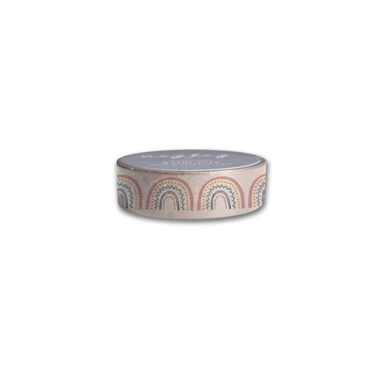The Maylay Co. Happy Rainbows Washi Tape, ideal for crafting supplies, showcases colorful arch-like designs in earthy tones. It is positioned horizontally and has a small pink and white label on top against a plain white background.