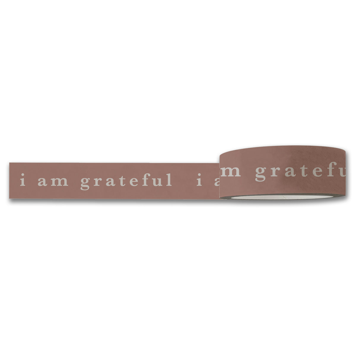 A roll of mauve washi tape, perfect for scrapbooking supplies, showcases the repeated phrase "i am grateful" in white letters. This decorative I Am Grateful Washi Tape by Maylay Co. is partially unrolled, beautifully displaying the text.